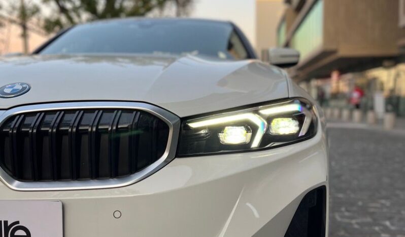 
								BMW 330E Año 2023 lleno									