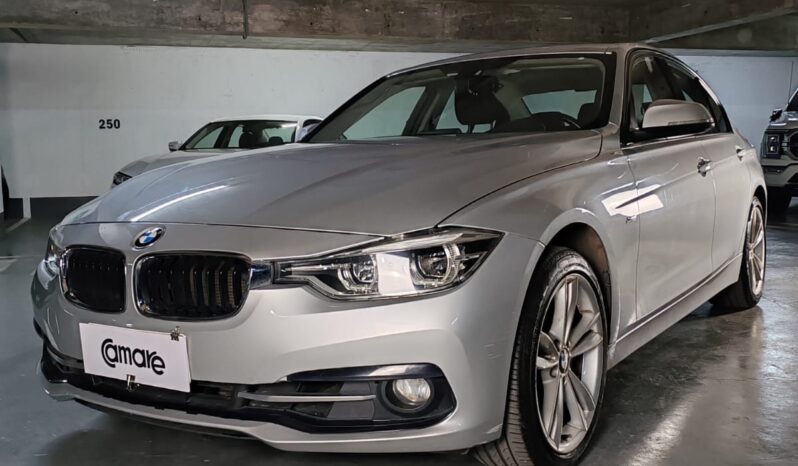 
								BMW 318 Sport lleno									