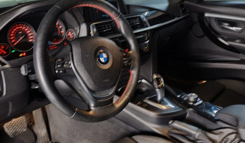 
								BMW 318 Sport lleno									