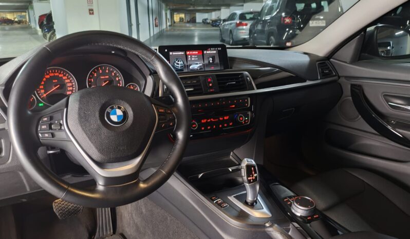 
								BMW 418i lleno									